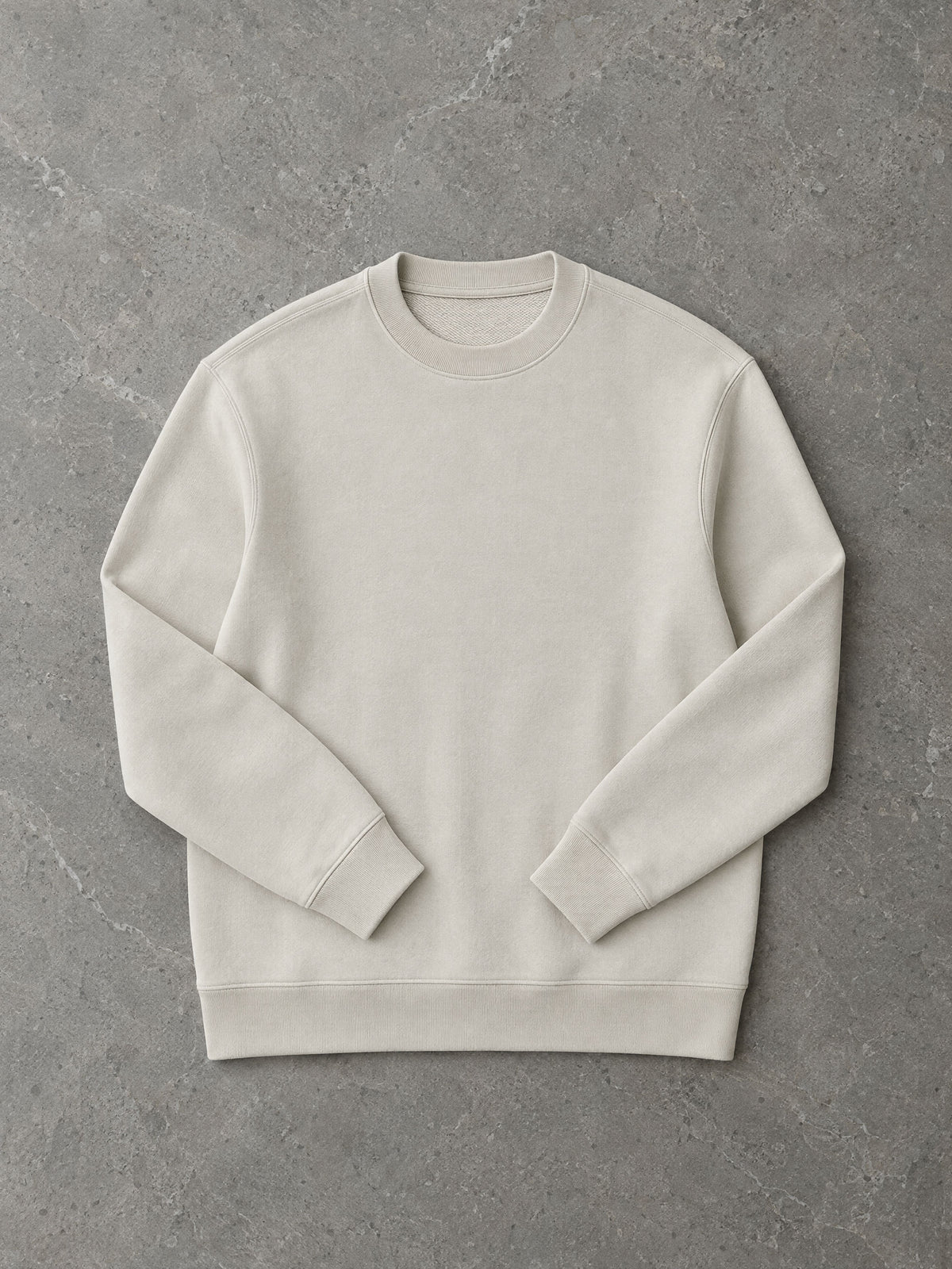 Lot 001 The Loopback Crew in Bone, flat lay on stone