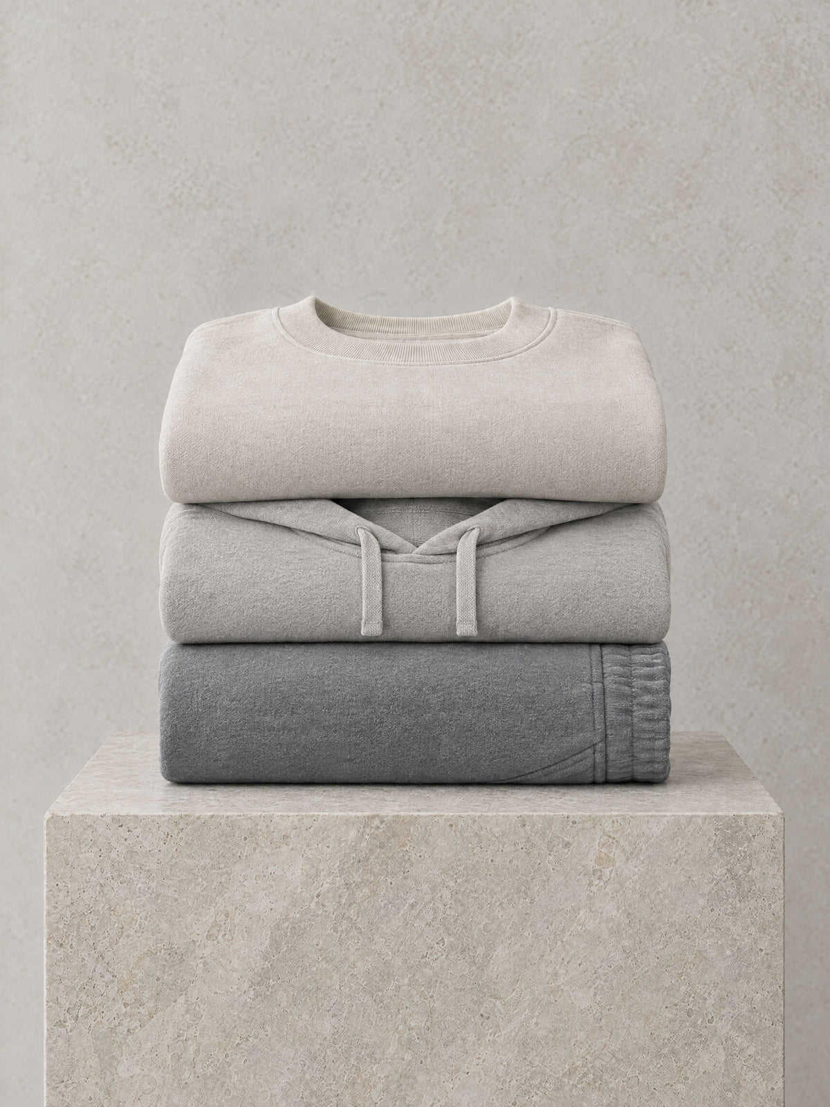 Lot 001 — crew, hoodie and sweatpant folded in one stack